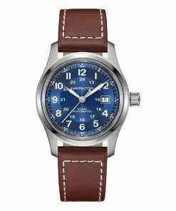 Descubre el Hamilton Khaki Field Automatic 42 mm (ref. H70605540): reloj automático suizo con esfera azul sunray y efecto snailing, movimiento H‑10 (80 h reserva de marcha), resistencia 100 m, cristal de zafiro, resorte Nivachron, Super‑LumiNova y fondo abierto. Estilo militar moderno con precisión fiable.