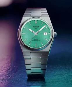 Detalle de la caja del TISSOT PRX 40 mm Powermatic 80 en acero con dial verde menta