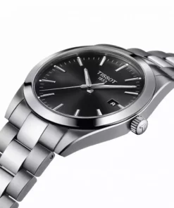 Detalle de la esfera negra, fecha y corona del Tissot Gentleman 40 mm T127.410.11.051.00 - UNITIME Argentina