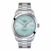 Vista frontal del Tissot Gentleman automático con esfera verde agua, índices plateados y fecha a las 3