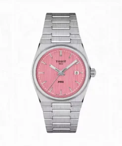 Reloj Tissot PRX 35 mm T137.210.11.331.00 con esfera rosa y malla de acero integrada, vista frontal en el Showroom de Unitime Argentina